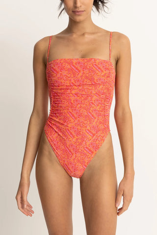 Orange paisley one-piece swimsuit with scrunched sides and high-cut leg.