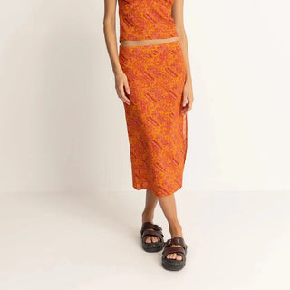 Orange paisley print low rise midi skirt with elastic back.