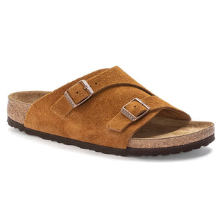 Mink Birkenstock Zurich sandals with soft suede upper, adjustable metal pin buckles, and contoured footbed.