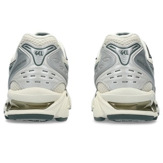 ASICS GEL-KAYANO 14 shoes in Birch/Dark Pewter with GEL cushioning.