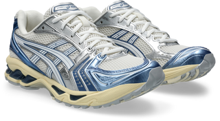 ASICS GEL-KAYANO® 14 running shoe in Cream/Denim Blue with GEL® technology cushioning and TRUSSTIC® support system.