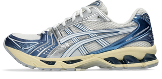 ASICS GEL-KAYANO® 14 running shoe in Cream/Denim Blue with GEL® technology cushioning and TRUSSTIC® support system.