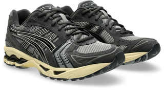 ASICS GEL-KAYANO® 14 sneaker in Clay Grey/Black with GEL™ technology and suede overlays.