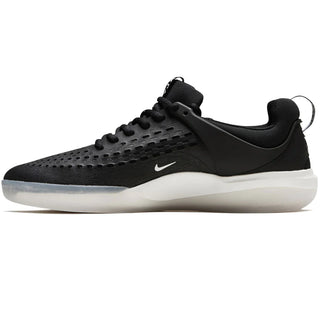 Nike SB Nyjah 3 skate shoe in black and white with Zoom Air technology and a grippy honeycomb outsole.