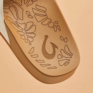 Olukai Kipe'a 'Olu Women's Leather Slide Sandals in Puka/Tan.