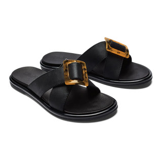 Olukai La'i Slide Women's Sandals in Black with tortoise shell buckle.