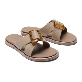 Olukai La'i Slide Women's Sandals in Taupe with tortoise shell buckle.