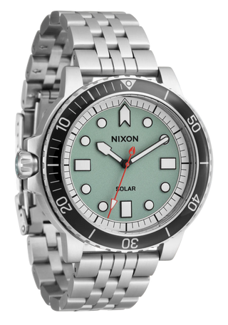 Nixon Stinger 44 Watch in Silver with jade dial, luminous indices, and stainless steel bracelet.