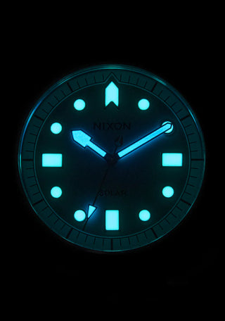 Nixon Stinger 44 Watch in Silver with jade dial, luminous indices, and stainless steel bracelet.