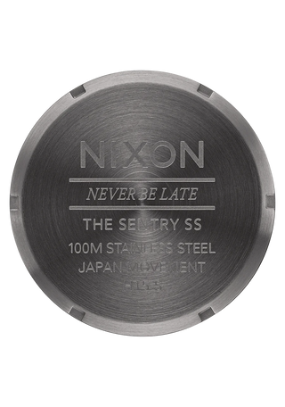 Nixon Sentry Stainless Steel Watch in all-gunmetal with a durable design and bilingual day/date function.