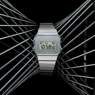 Casio A700WEV-7A watch with a slim case, stainless steel band, and LED backlight.