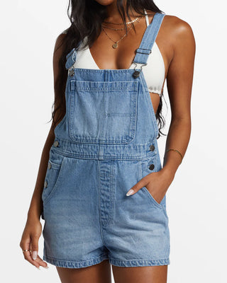 Billabong Sand Canyon Denim Short Overalls in Light Wash with adjustable straps and multiple pockets.