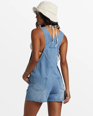 Billabong Sand Canyon Denim Short Overalls in Light Wash with adjustable straps and multiple pockets.