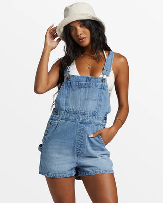 Billabong Sand Canyon Denim Short Overalls in Light Wash with adjustable straps and multiple pockets.