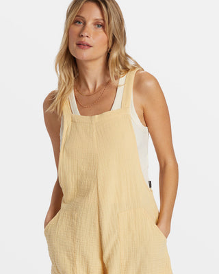 Billabong Beach Crush Romper in Pale Yellow with cotton gauze fabric, square neck, and adjustable straps.