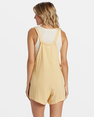 Billabong Beach Crush Romper in Pale Yellow with cotton gauze fabric, square neck, and adjustable straps.