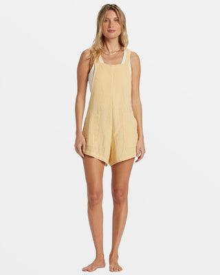 Billabong Beach Crush Romper in Pale Yellow with cotton gauze fabric, square neck, and adjustable straps.