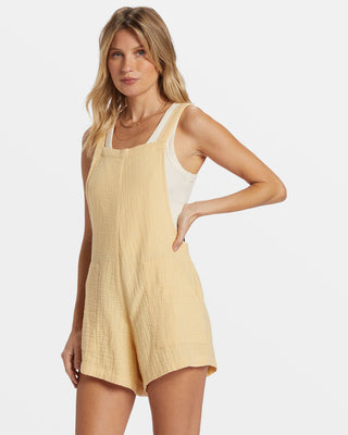 Billabong Beach Crush Romper in Pale Yellow with cotton gauze fabric, square neck, and adjustable straps.