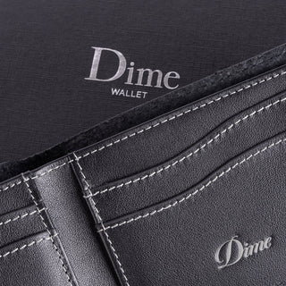 Black Leather bifold wallet with sleek design and durable construction.