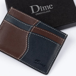 Black leather cardholder, 100% leather, sleek and minimalistic for essential organization.