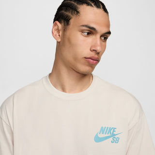 Nike SB Logo Skate T-Shirt in Light Orewood Brown with soft jersey fabric and classic logo, loose fit.