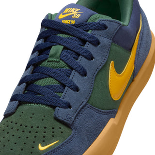 Nike SB Force 58 Skate Shoes in Midnight Navy/University Gold with suede and canvas upper, durable cupsole, and flexible tri-star sole design.