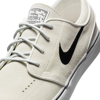 Nike SB Janoski OG+ Summit White/Black skate shoes with suede upper and Zoom Air cushioning.