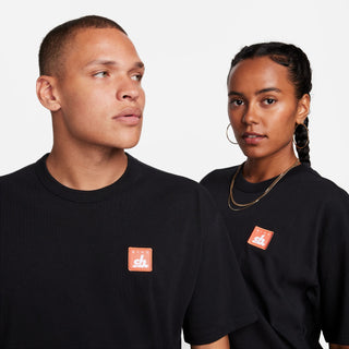 Nike SB Embroidered Patch Logo Skate T-shirt in Black, made from 100% cotton with a ribbed collar.