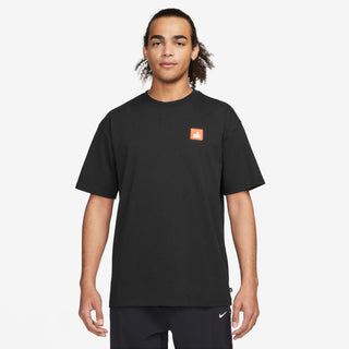 Nike SB Embroidered Patch Logo Skate T-shirt in Black, made from 100% cotton with a ribbed collar.