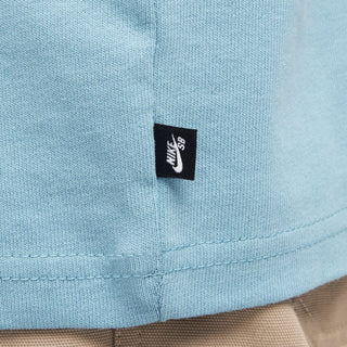 Nike SB Skate T-Shirt in Denim Turquoise, midweight cotton with a ribbed collar for comfort and easy layering.