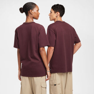 Nike SB Skate T-Shirt in Burgundy Crush with ribbed collar and relaxed fit.