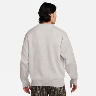 Nike SB City of Love Light Bone Sweater with a detailed Cain sculpture knit design, breathable and roomy.