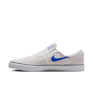 Nike SB Janoski+ Slip Shoes in Summit White and Hyper Royal, featuring suede upper and Zoom Air cushioning.