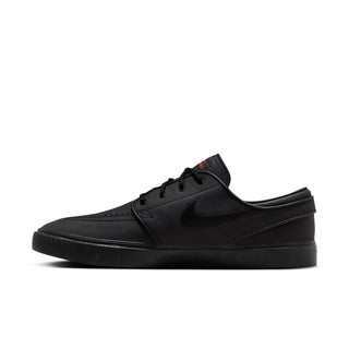 Black Nike SB Zoom Janoski OG+ ISO skate shoes with leather upper and vulcanized sole.