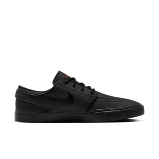 Black Nike SB Zoom Janoski OG+ ISO skate shoes with leather upper and vulcanized sole.