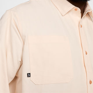 Nike SB Long-Sleeve Woven Skate Top in durable cotton canvas with a roomy fit and button-up design.