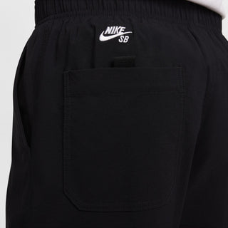 Nike SB Kearny Cargo Skate Pants in Black with six pockets and webbing belt.