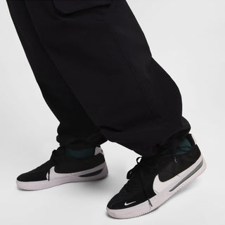 Nike SB Kearny Cargo Skate Pants in Black with six pockets and webbing belt.