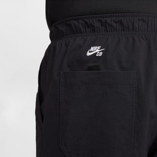 Nike SB Kearny Cargo Skate Pants in Black with six pockets and webbing belt.