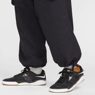 Nike SB Kearny Cargo Skate Pants in Black with six pockets and webbing belt.