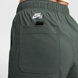 Nike SB Kearny Cargo Skate Pants in Vintage Green with six pockets and webbing belt.