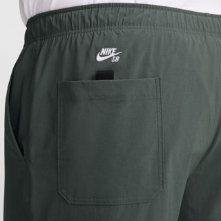 Nike SB Kearny Cargo Skate Pants in Vintage Green with six pockets and webbing belt.