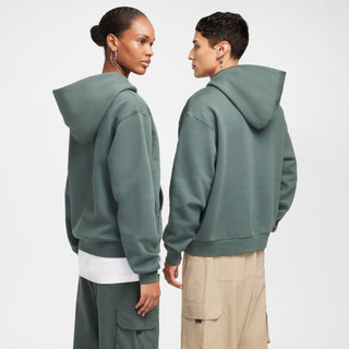 Nike SB green fleece pullover hoodie with logo and roomy fit.

