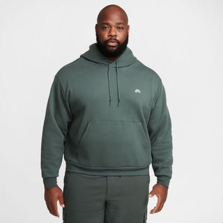 Nike SB green fleece pullover hoodie with logo and roomy fit.

