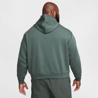 Nike SB green fleece pullover hoodie with logo and roomy fit.

