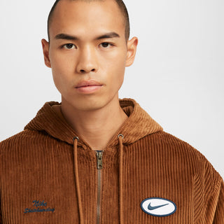 Nike SB Full-Zip Hooded Corduroy Skate Jacket with roomy fit, sweat-wicking lining, and classic skateboarding details.