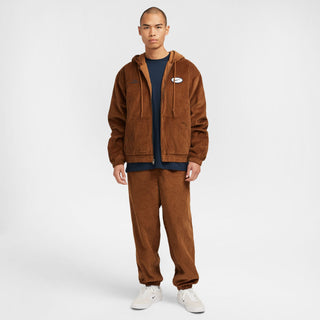 Nike SB Full-Zip Hooded Corduroy Skate Jacket with roomy fit, sweat-wicking lining, and classic skateboarding details.