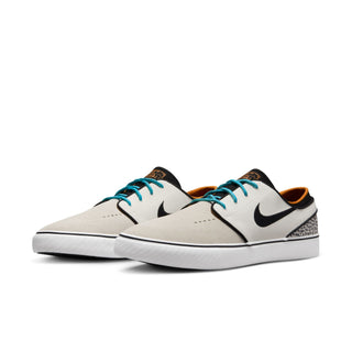 Nike SB Zoom Janoski OG+ Electric in Phantom/Chlorine Blue-Black with suede upper and Zoom Air cushioning.