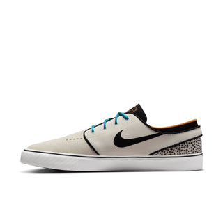 Nike SB Zoom Janoski OG+ Electric in Phantom/Chlorine Blue-Black with suede upper and Zoom Air cushioning.