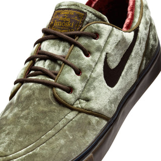 Nike SB Zoom Janoski OG+ SE in Medium Olive with velvet upper, Air Zoom cushioning, and skate-specific tread.